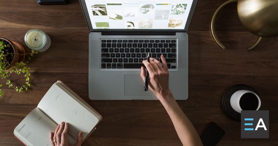 A person working on web design on a laptop